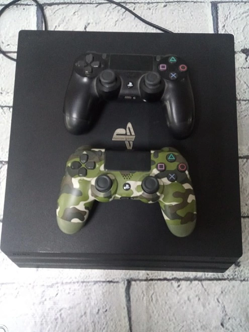 Игровая приставка PS4 Sony  PlayStation 4 Pro 1TB Black