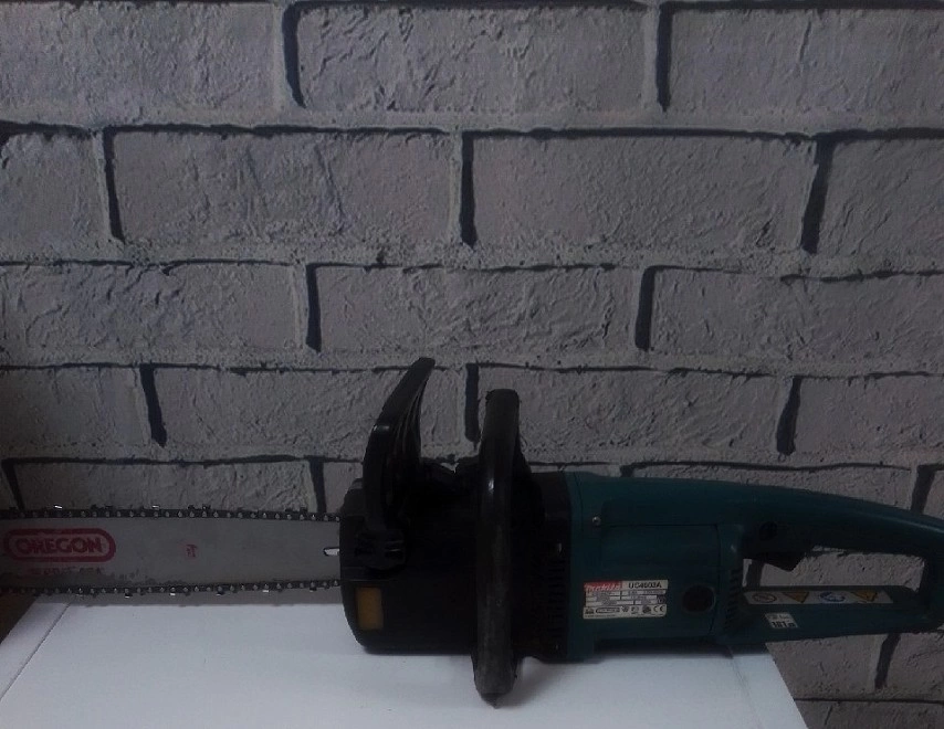 Электропила цепная Makita  UC4003A
