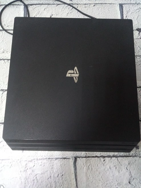 Игровая приставка PS4 Sony  PlayStation 4 Pro 1TB Black