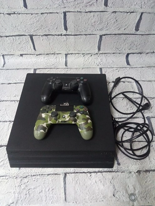 Игровая приставка PS4 Sony  PlayStation 4 Pro 1TB Black